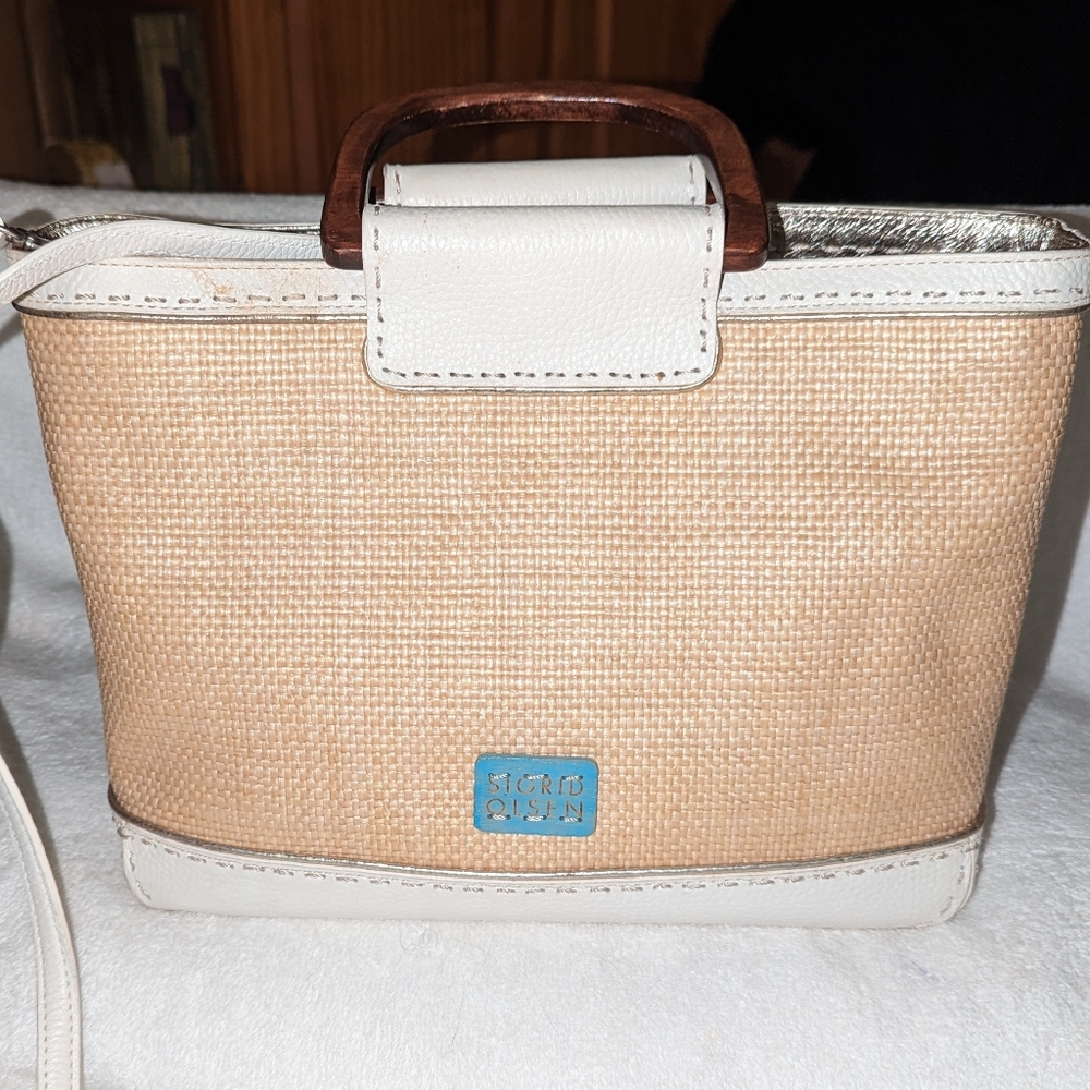 Sigrid Olsen tan textured with white leather trim and wood handles.